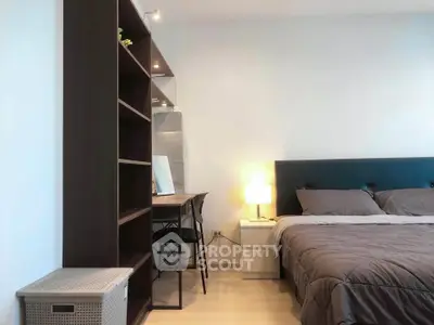 Modern bedroom with stylish furniture and cozy lighting, perfect for relaxation and comfort.