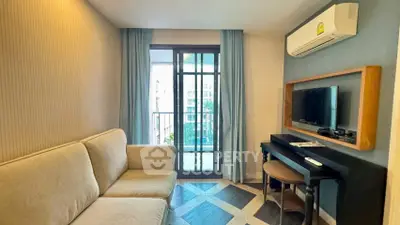 Cozy living room with balcony view and modern decor