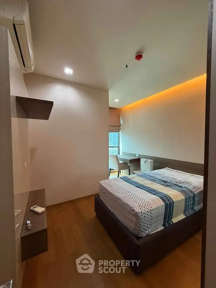 Cozy bedroom with modern design and ambient lighting