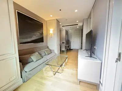 Modern living room with sleek furniture and elegant decor in a stylish apartment.