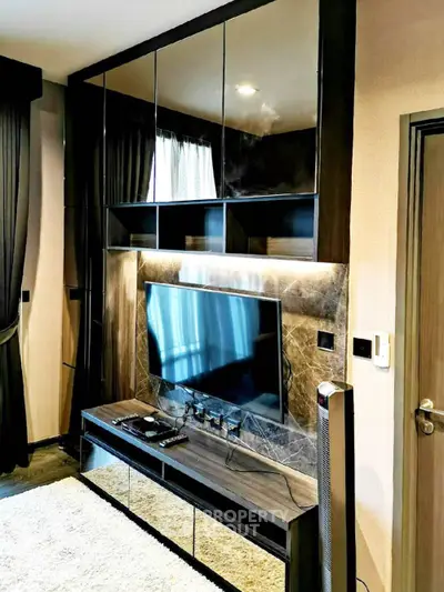 Modern living room with sleek TV unit and stylish decor