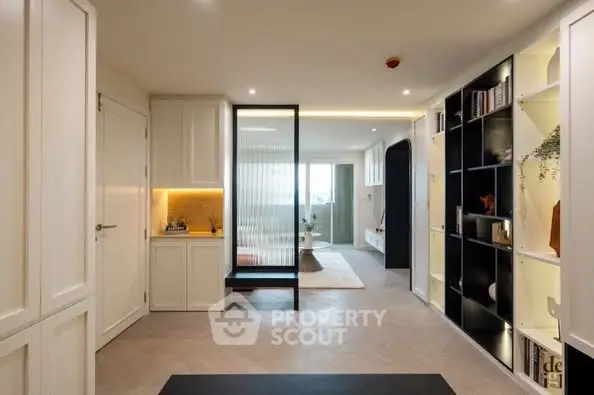 Modern living room with elegant shelving and ambient lighting