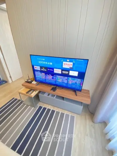 Modern living room with sleek TV setup and stylish decor