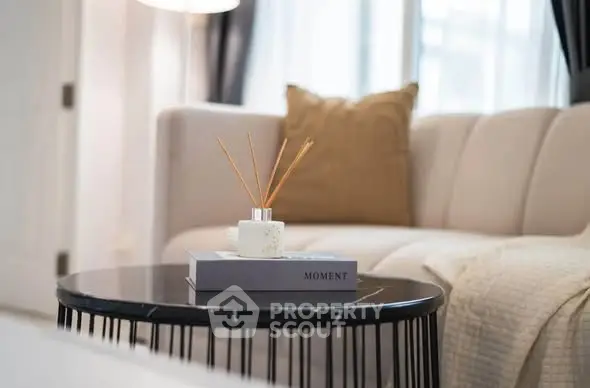 Stylish living room with modern decor and cozy seating area.
