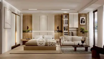 Luxurious modern bedroom with elegant decor and cozy seating area