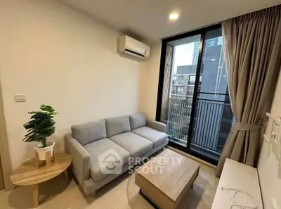 Modern living room with cozy sofa and large window view