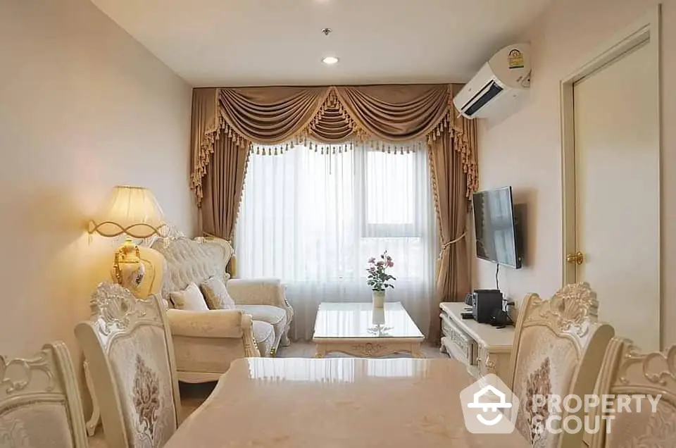 Elegant living room with classic furniture, ornate curtains, and a cozy ambiance, perfect for sophisticated living in a serene environment.