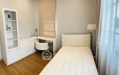 Cozy bedroom with minimalist decor and natural light