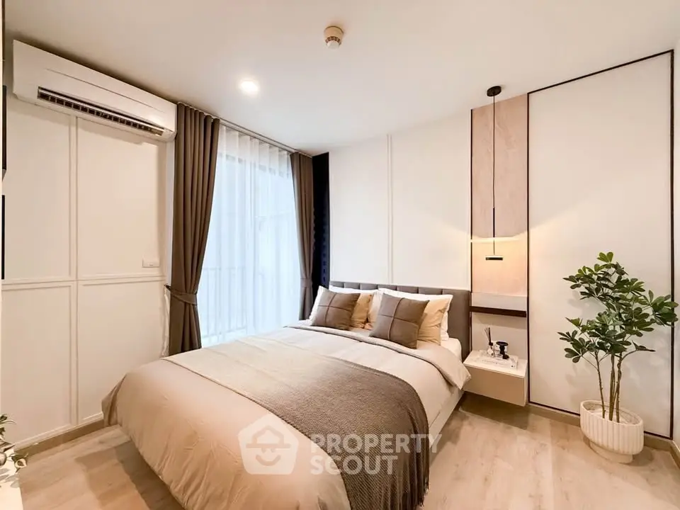 Modern bedroom with cozy decor and natural light