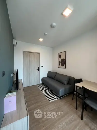 Modern living room with stylish decor and cozy seating area