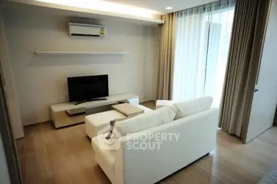 Modern living room with sleek furniture and natural light
