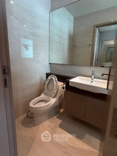 Modern bathroom with sleek fixtures and elegant tile design