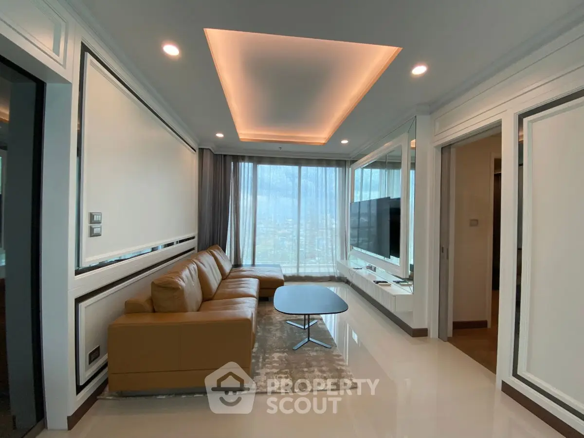 Luxurious modern living room with city view, featuring sleek design and elegant lighting.