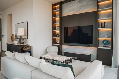 Luxurious modern living room with elegant decor and ambient lighting