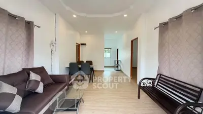 Spacious living room with modern furniture and elegant decor
