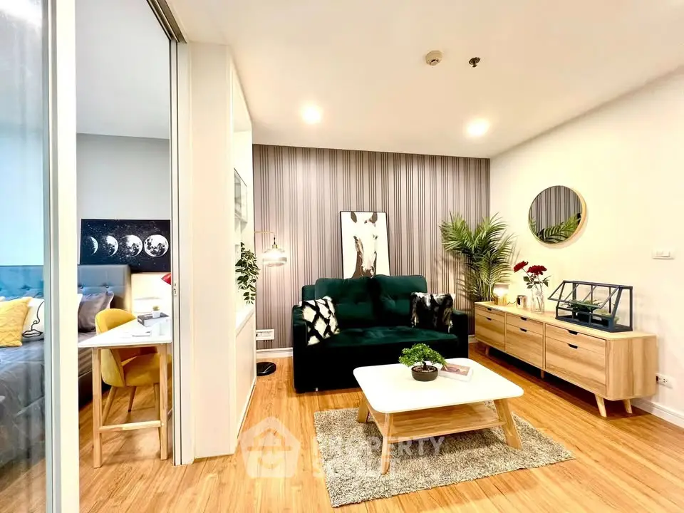 Modern living room with stylish decor and open layout, featuring a cozy seating area and elegant furnishings.