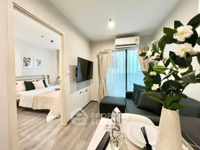 Modern apartment interior with cozy living room and elegant bedroom, featuring stylish decor and natural light.