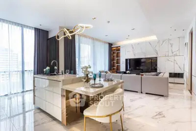 Luxurious open-plan living room with modern kitchen and elegant decor