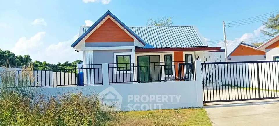 Charming single-story house with modern design and spacious yard in a serene neighborhood.