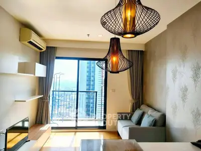 Modern living room with stylish lighting and balcony view