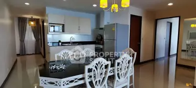 Spacious open-layout kitchen and dining area with elegant furnishings and modern appliances.