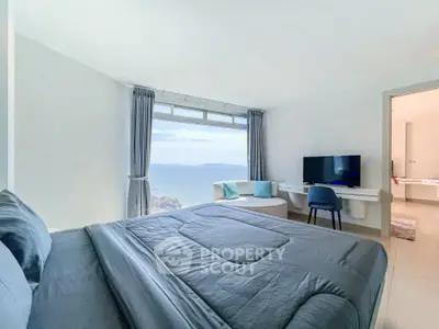 Luxurious bedroom with stunning ocean view and modern decor