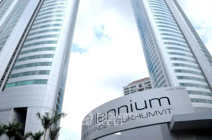 Stunning view of Millennium Residence at Sukhumvit with modern architecture and towering skyscrapers.