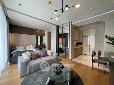 Luxurious open-plan living room with modern kitchen and stylish decor