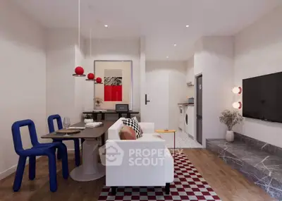 Modern living room with stylish decor, open layout, and vibrant accents in a cozy apartment.