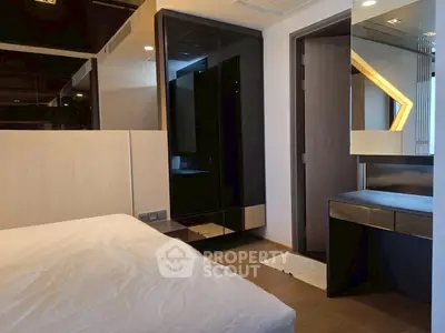 Modern bedroom with sleek design and elegant furnishings