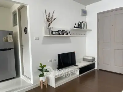Modern living room with sleek TV stand and minimalist decor