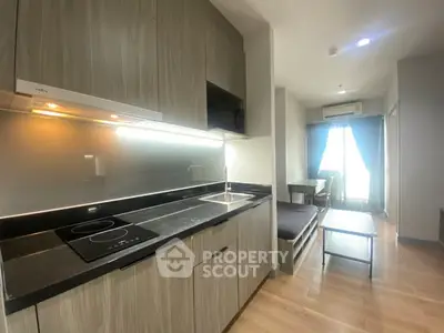 Modern kitchen with sleek design and open layout in a bright apartment