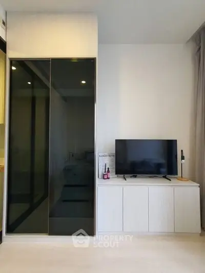 Modern living room with sleek TV stand and stylish storage solutions