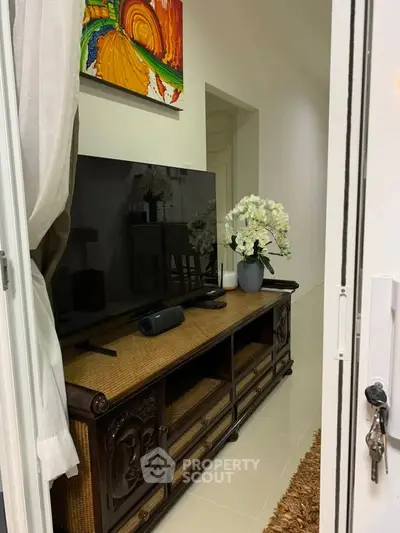 Stylish living room with modern TV setup and elegant decor