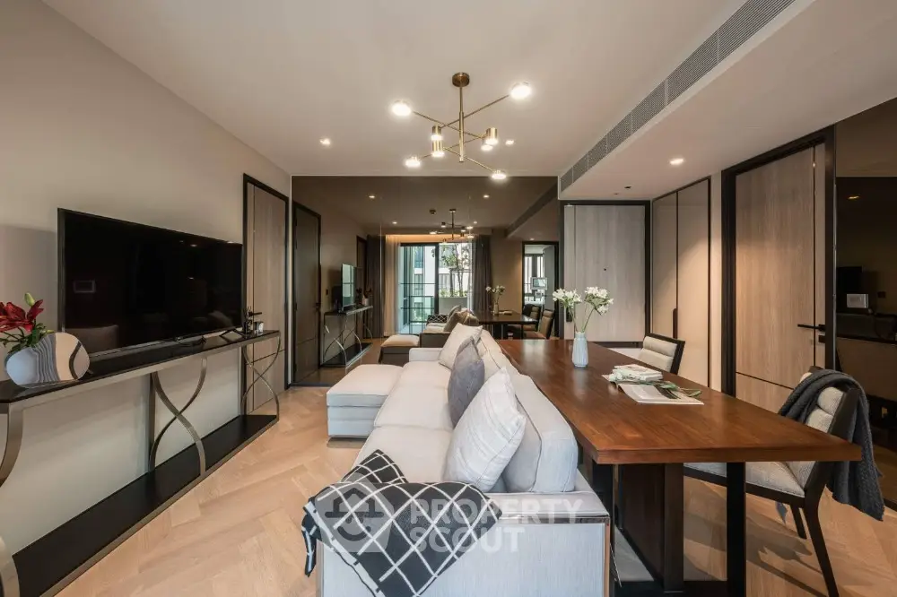 Modern living room with elegant decor and spacious dining area