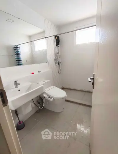 Modern bathroom with sleek fixtures and natural light