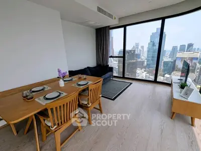 Modern living room with panoramic city view and elegant dining area