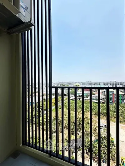 Stunning balcony view with cityscape and greenery, perfect for relaxation and enjoying the outdoors.