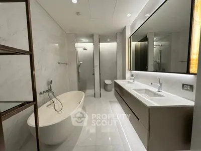 Luxurious modern bathroom with freestanding bathtub and dual sinks