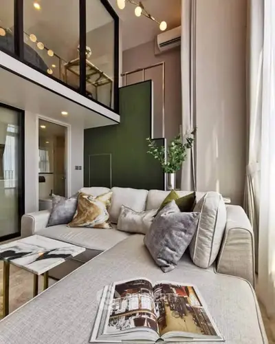 Luxurious modern living room with high ceilings and elegant decor