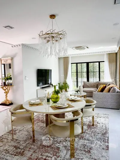 Luxurious living room with elegant dining area and modern decor