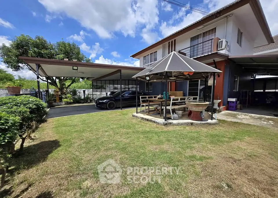 Charming suburban home with spacious garden and carport, perfect for family living.