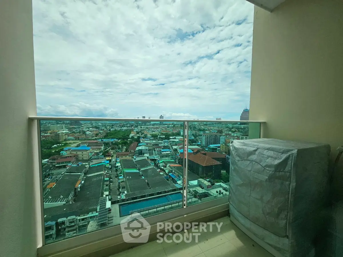 Stunning cityscape view from a high-rise balcony, perfect for urban living enthusiasts.