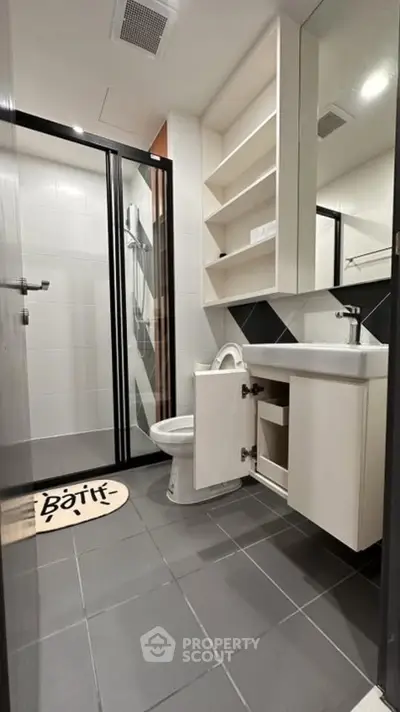 Modern bathroom with sleek design and spacious shower area