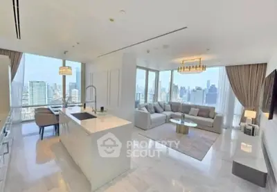 Luxurious open-plan living room with stunning city views and elegant furnishings.