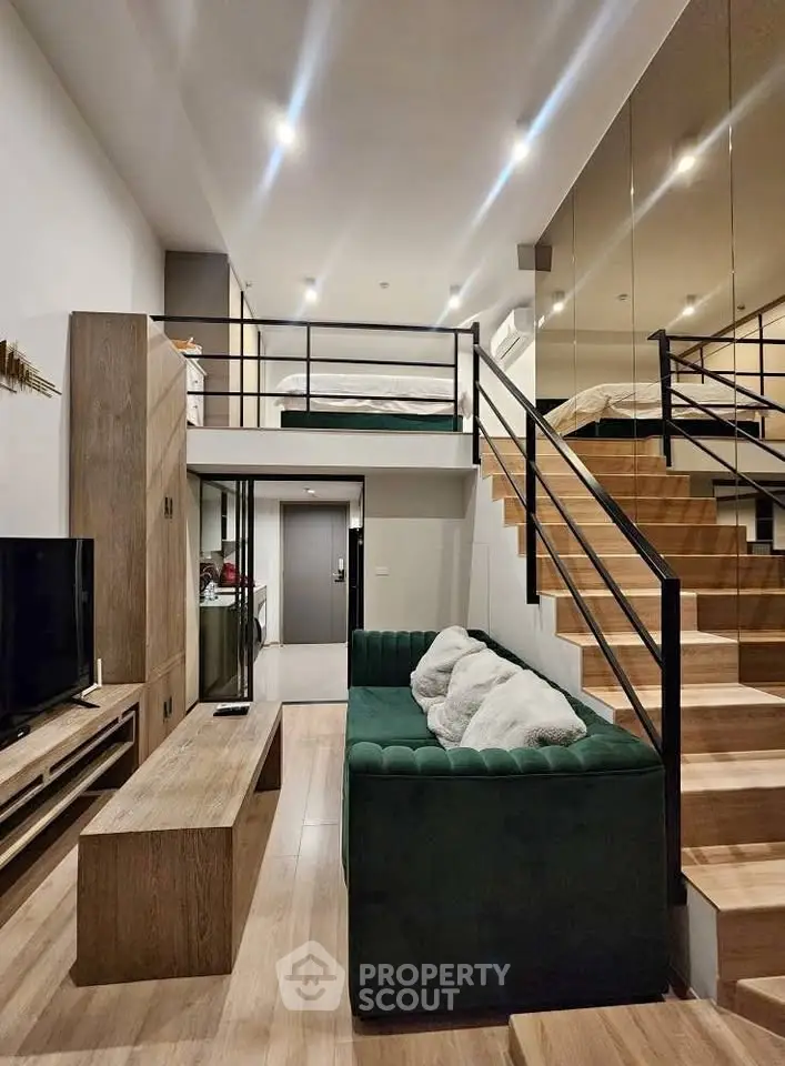Modern loft apartment with stylish living room and mezzanine bedroom