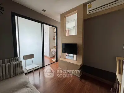 Modern living room with sleek design and wooden flooring