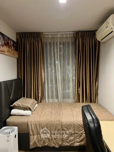 Cozy bedroom with elegant curtains and modern air conditioning unit