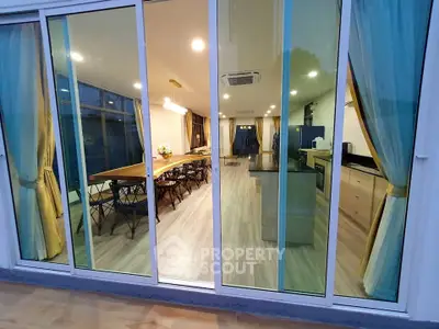 Spacious modern kitchen with open layout and elegant dining area