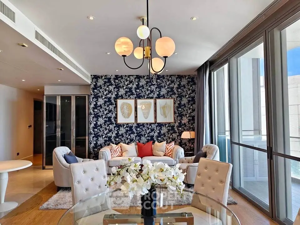 Luxurious modern living room with elegant decor and large windows offering natural light.